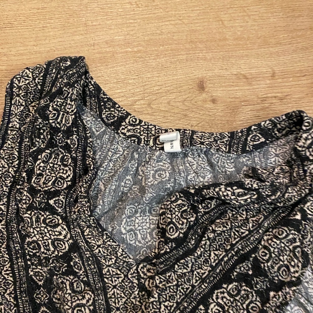 Gentle Fawn Black and White Asymmetrical Sleeveless Blouse - Picture 6 of 11